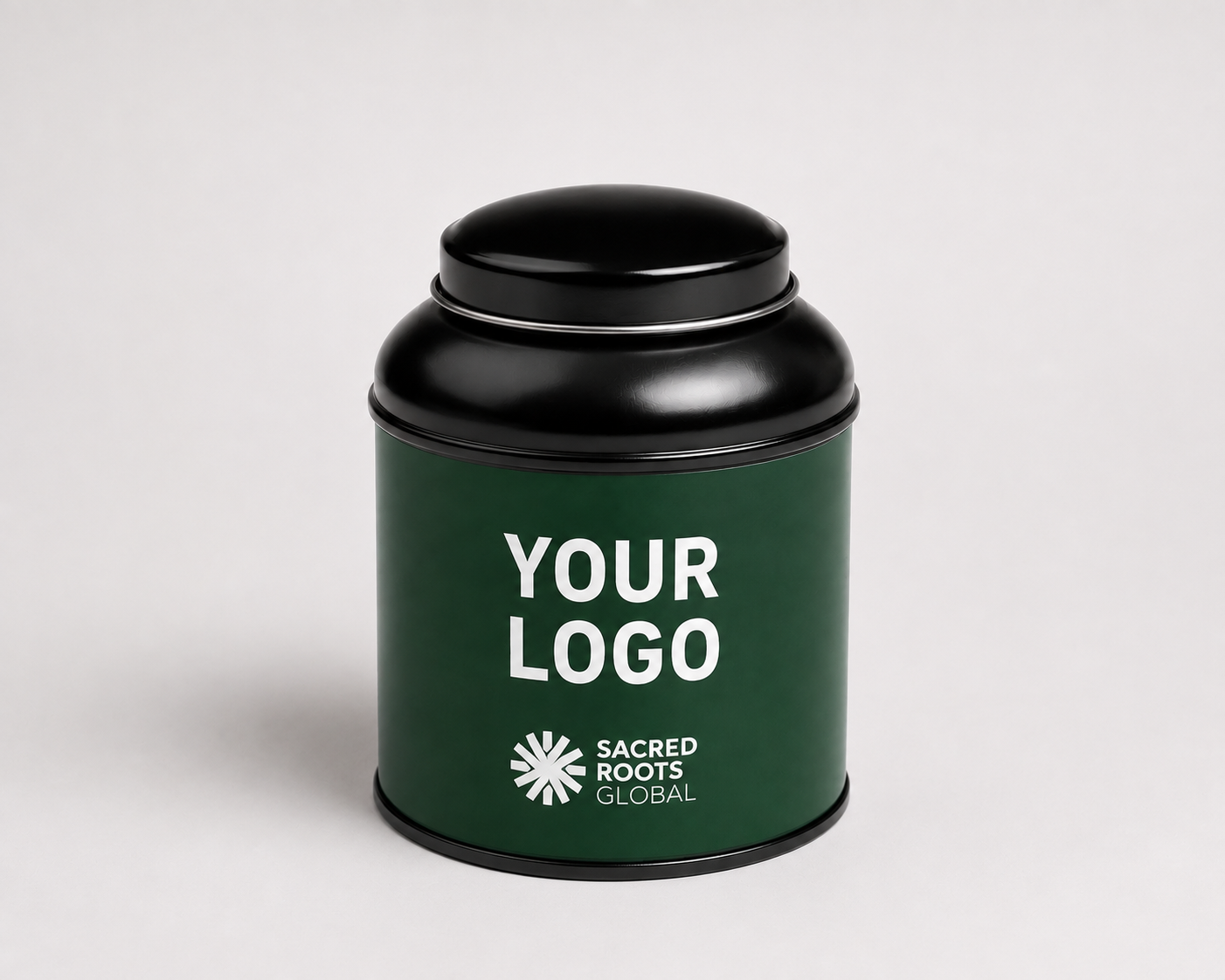 A premium Black cylindrical metal tea canister, ready for your own branding. Simply add your logo and packaging design to create a bespoke tea tin for your brand.