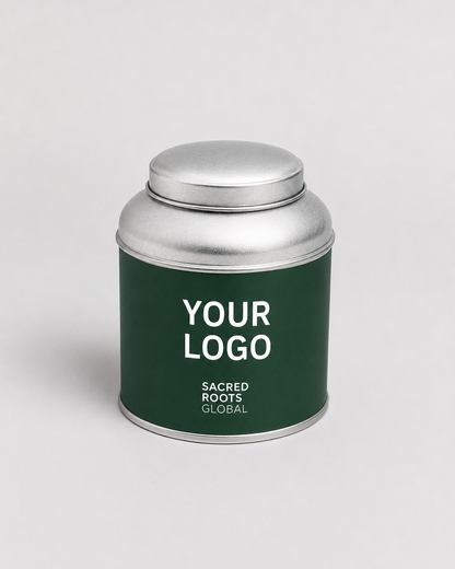 A premium silver cylindrical metal tea canister, ready for your own branding. Simply add your logo and packaging design to create a bespoke tea tin for your brand.