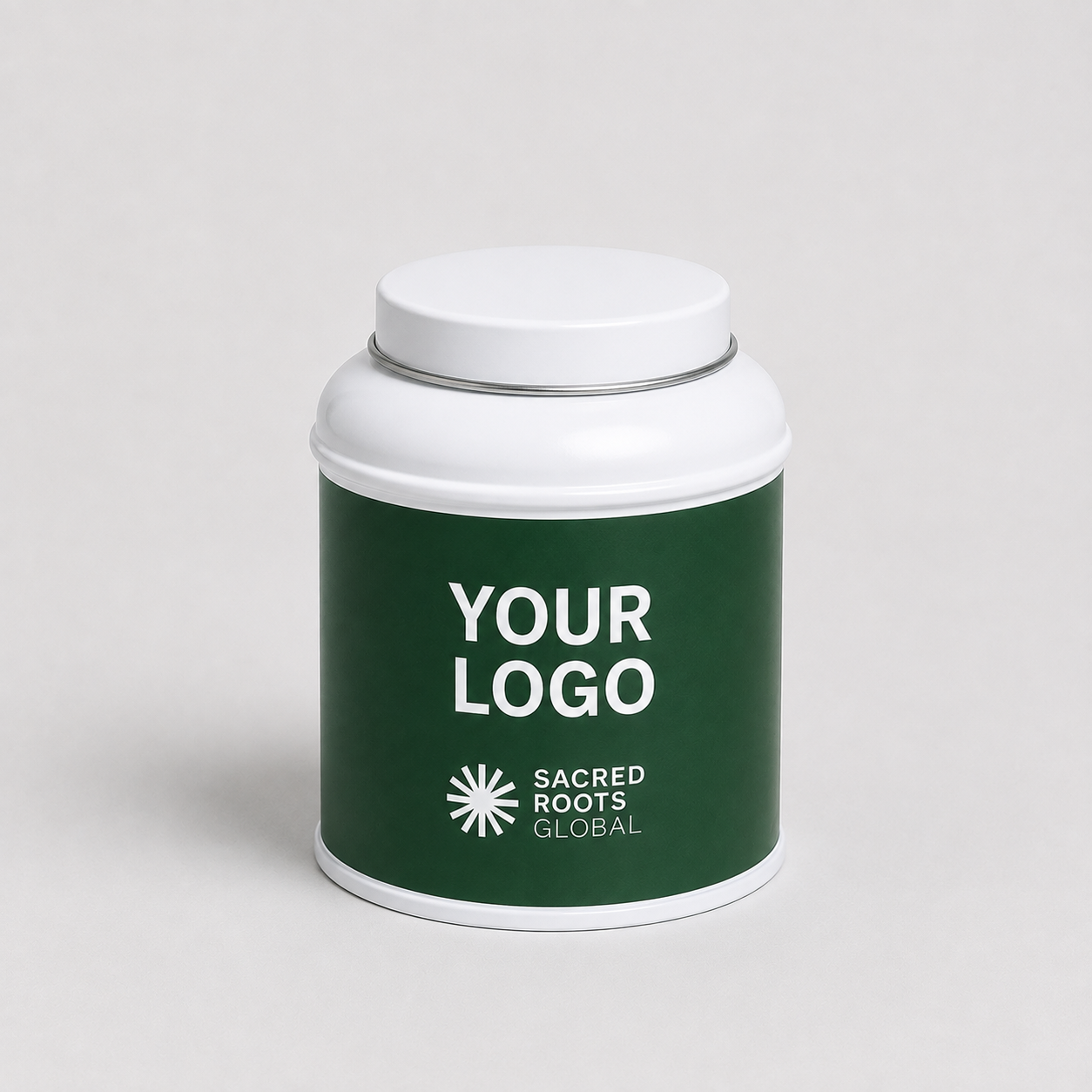 A premium white cylindrical metal tea canister, ready for your own branding. Simply add your logo and packaging design to create a bespoke tea tin for your brand.